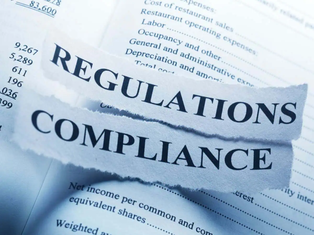 An image of regulations and compliance on paper