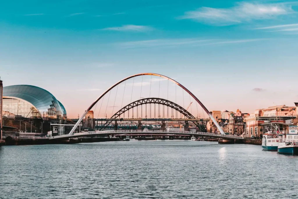 a wide angle shot of the river tyne looking at the tyne bridge